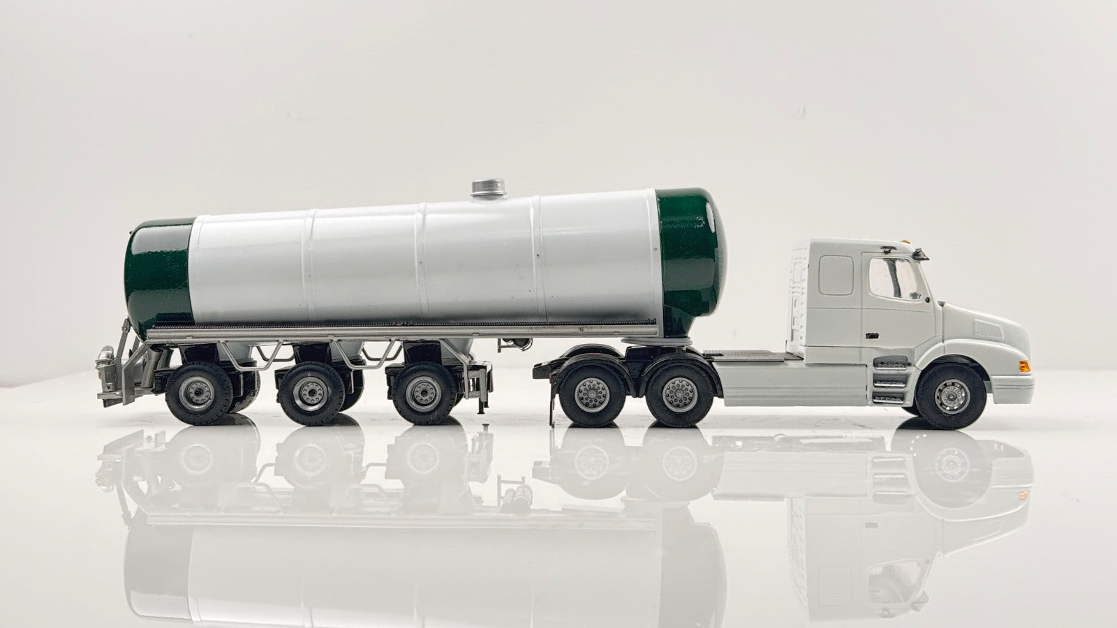LION TOYS 1/50 SCALE - VOLVO TRACTOR UNIT & GREEN/WHITE TANKER TRAILER - BOXED