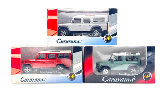 CARARAMA 1/43 SCALE - 3 X ASSORTED LAND ROVER DEFENDERS GREEN/RED/SILVER - BOXED