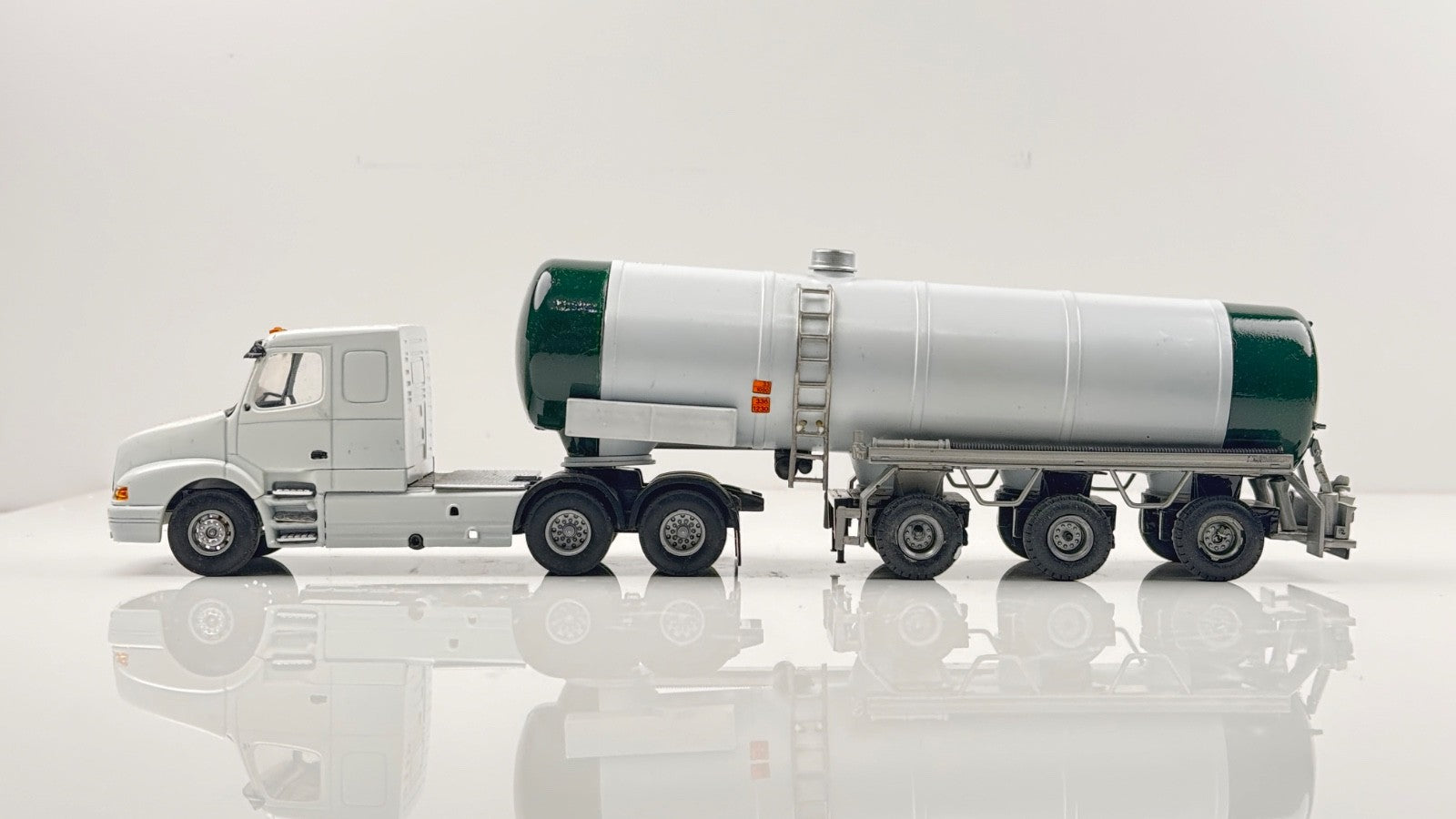 LION TOYS 1/50 SCALE - VOLVO TRACTOR UNIT & GREEN/WHITE TANKER TRAILER - BOXED